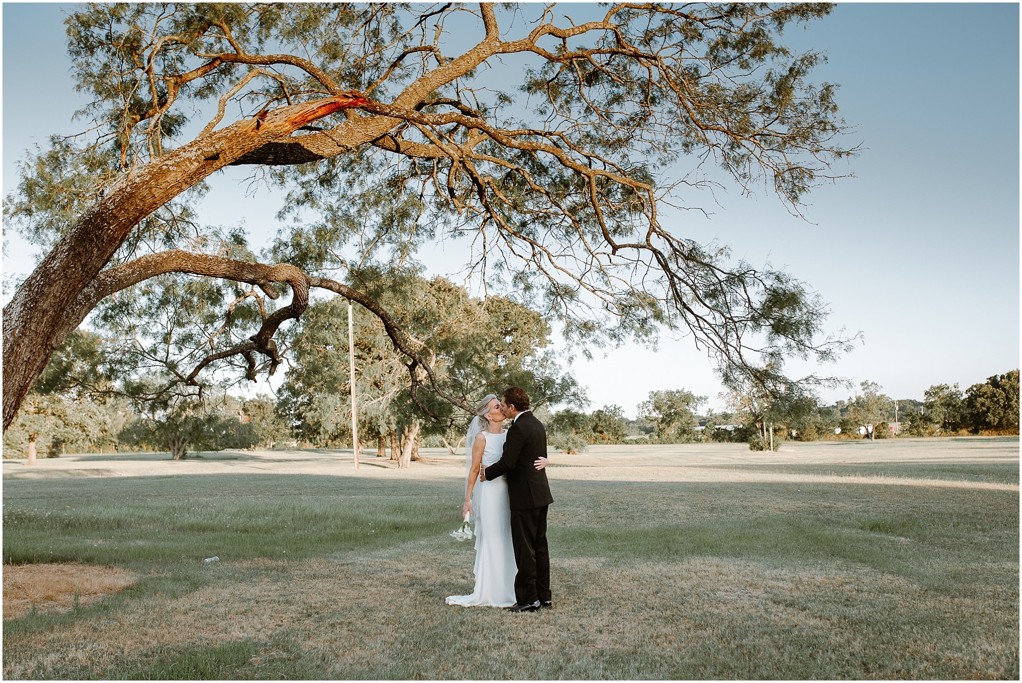 rustic destination wedding in ennis texas bride and groom